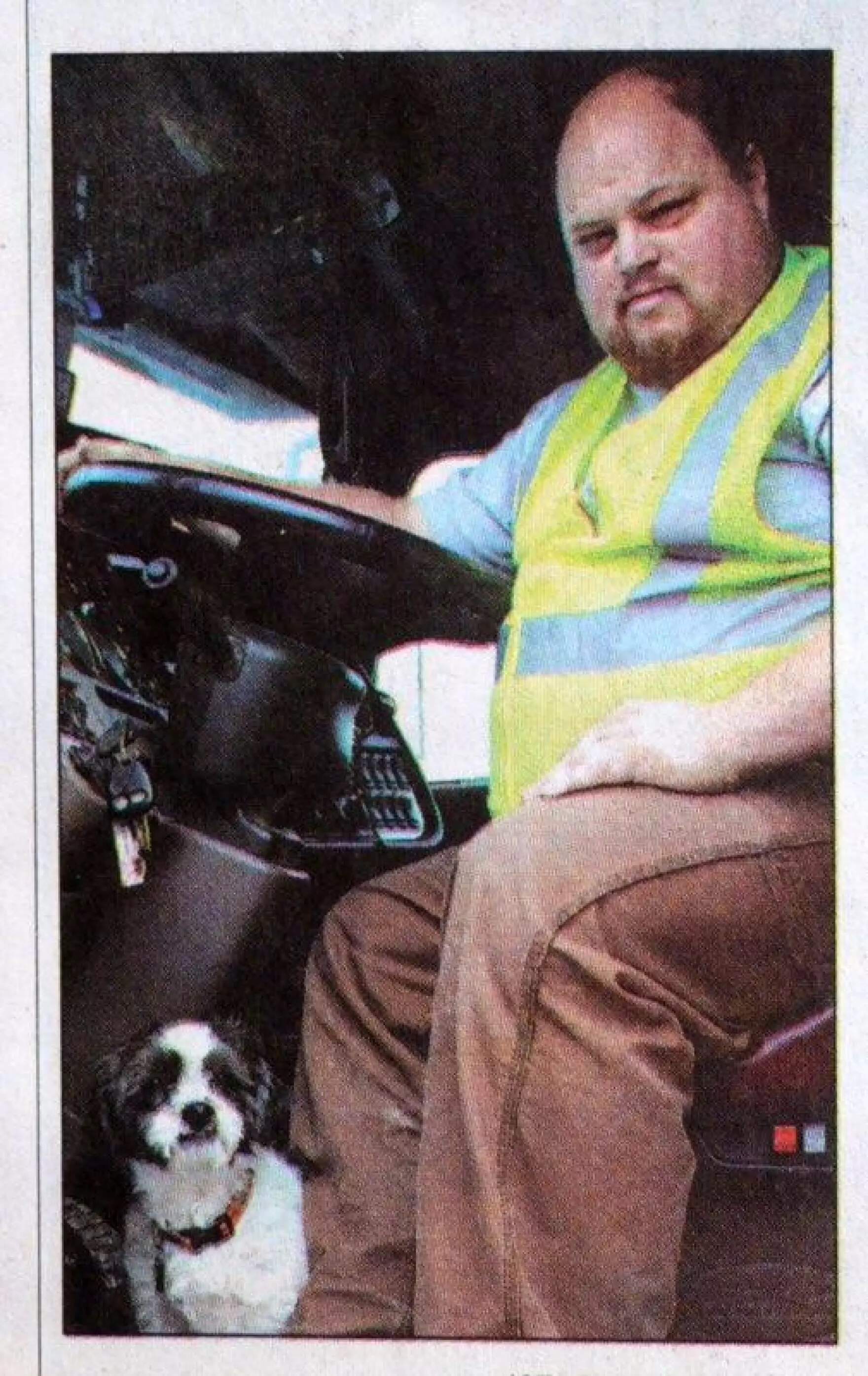 Bryan MacFarlane in the front seat of a truck. (Courtesy image via Maine Public)