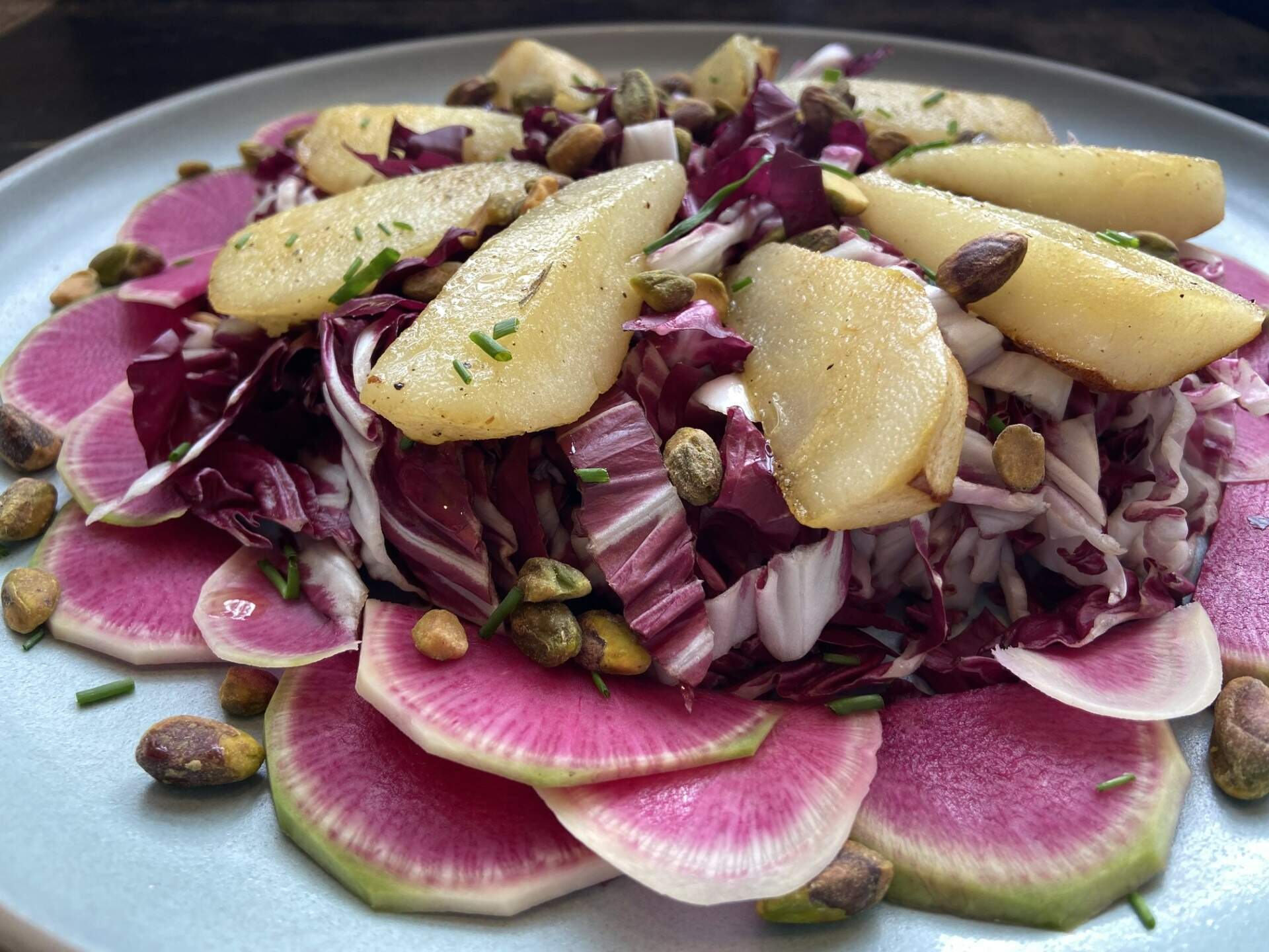 Radicchio, roasted pear, radish and pistachio salad. (Kathy Gunst/Here &amp; Now)