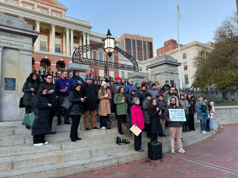 Activists for the homeless gathered on the State House steps to press lawmakers for shelter funding. (Walter Wuthmann/WBUR)