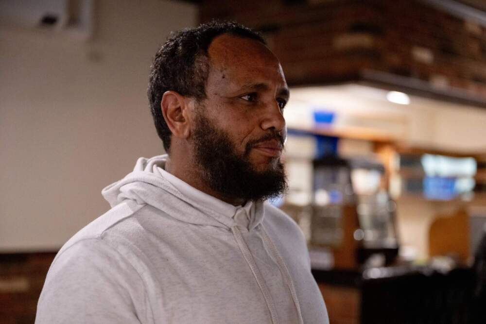 Muktar Hersi, owner of Naima restaurant, speaks in his restaurant in Lewiston, Maine. (Raquel C. Zaldívar/New England News Collaborative)