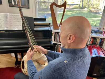 Eric Shimelonis plays the ngoni: a string instrument originating from West Africa and played mostly in Mali and Burkina Faso. (courtesy of Rebecca Sheir)