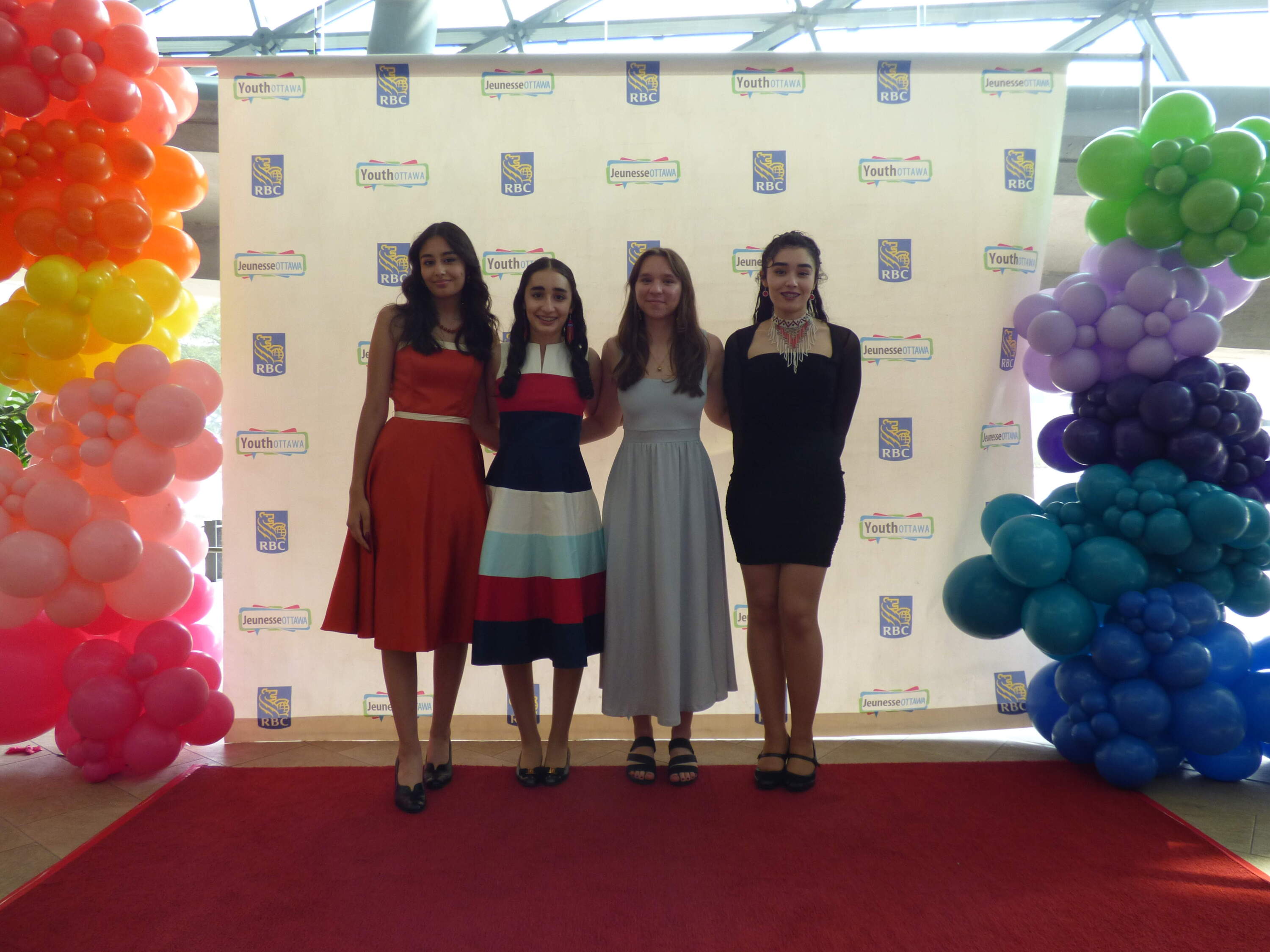 Zara (far left) and Taliah Lyons (far right). (Courtesy)