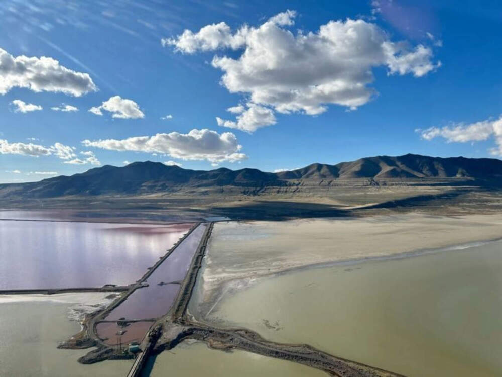 Compass Minerals uses evaporation ponds to extract products like salt, potassium and magnesium. The company says it would have used these same ponds to produce lithium, requiring no additional evaporated water. (Peter O'Dowd/Here & Now)