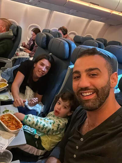 Abood Okal, Wafaa Abuzayda and their son Yousef flying to Gaza to visit family. (Courtesy Sammy Nabulsi)