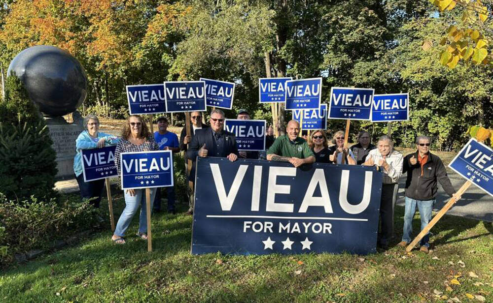 Incumbent John Vieau canvasing with supporters. (Via Mayor John Vieau's campaign Facebook page/NEPM)