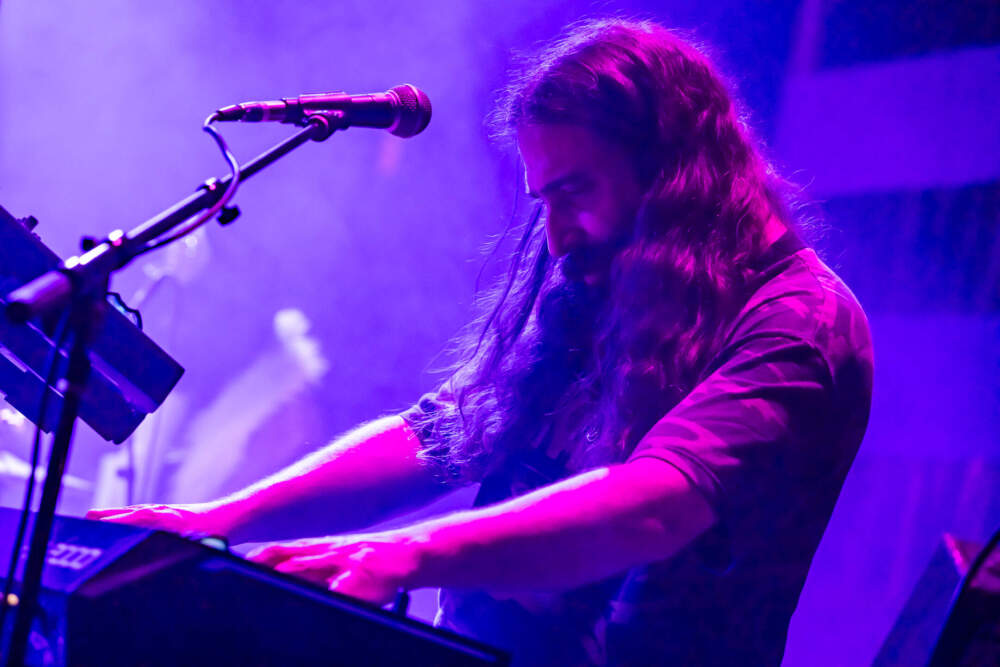 Daniel Bedrosian playing the keyboard during a performance. (Courtesy Mike Chiodo)