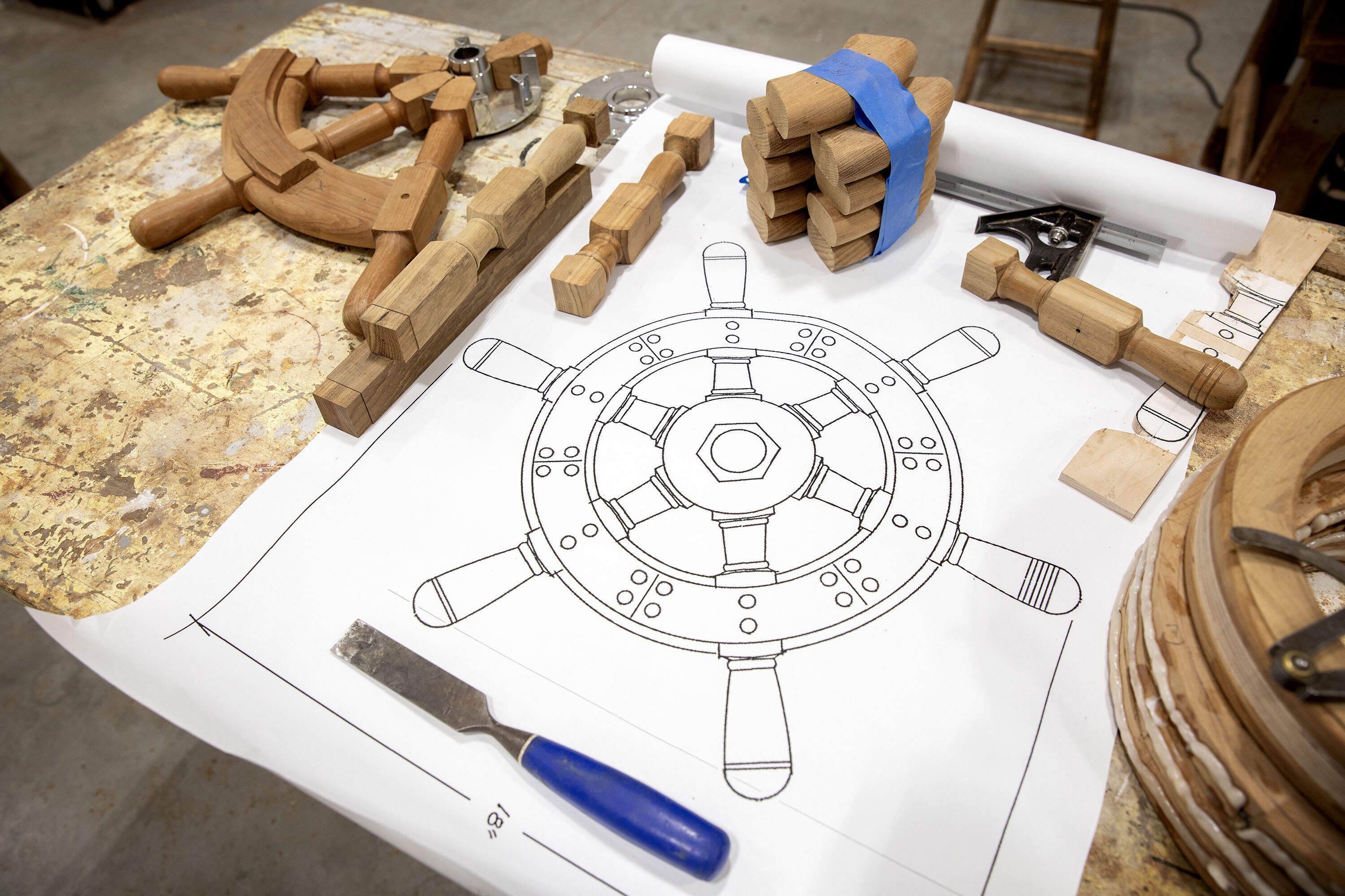 A yacht steering wheel design on a workbench at South Shore Boatworks in Carver, Mass. (Robin Lubbock/WBUR)