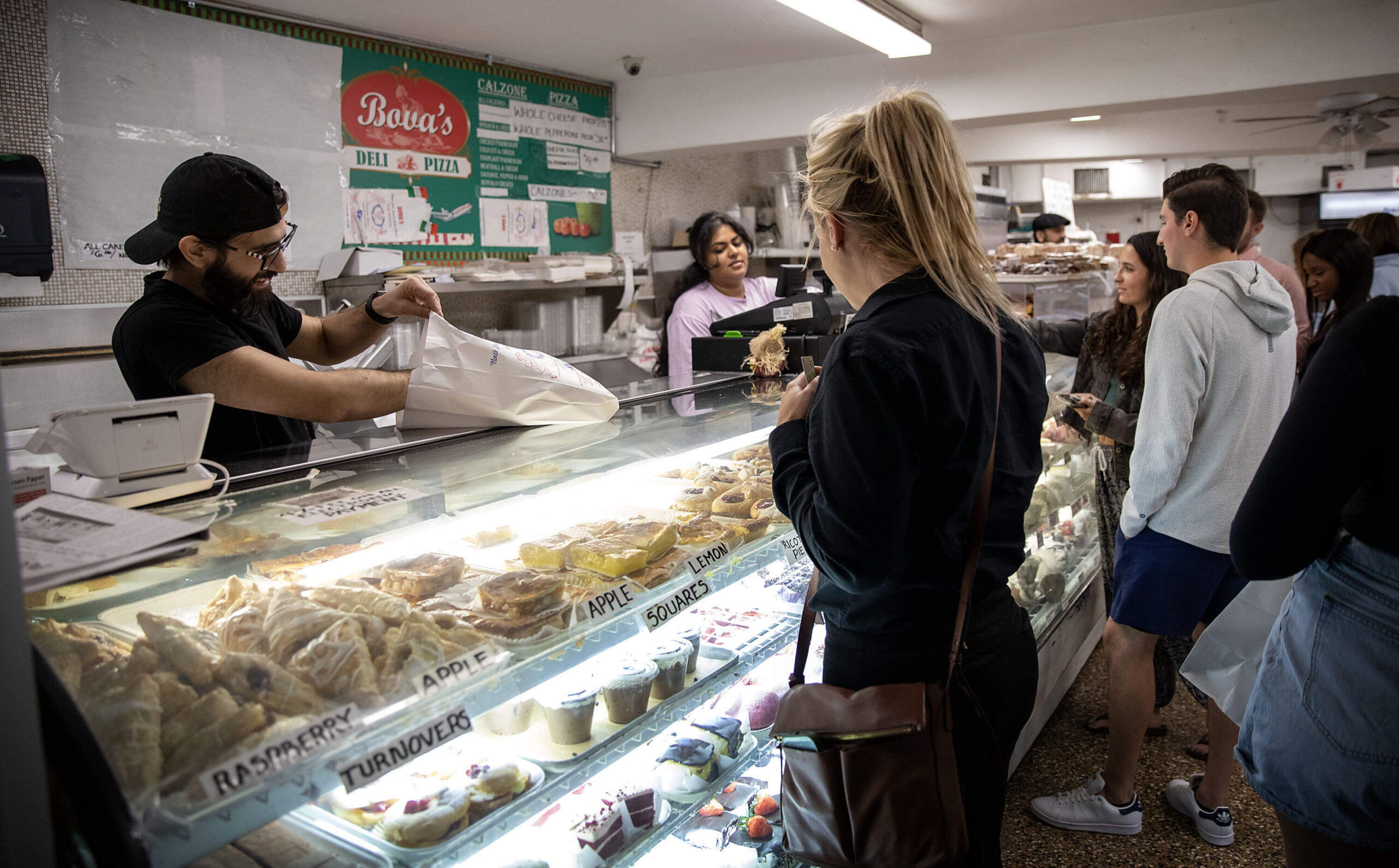 Customers order pastries at Bova's Bakery in Boston's North End. (Robin Lubbock/WBUR)