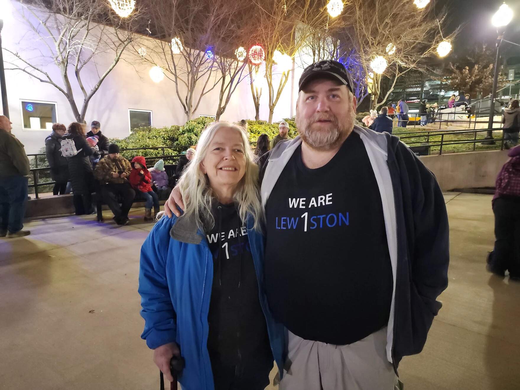 Martha and Matthew Agren at the Lewiston holiday festival on Dec. 2, 2023. (Susan Sharon/Maine Public)