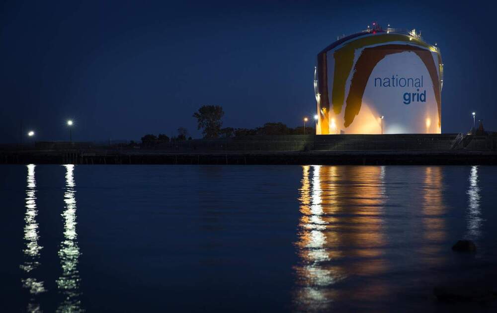 The National Grid gas tank in Dorchester designed by artist Corita Kent. (Robin Lubbock/WBUR)