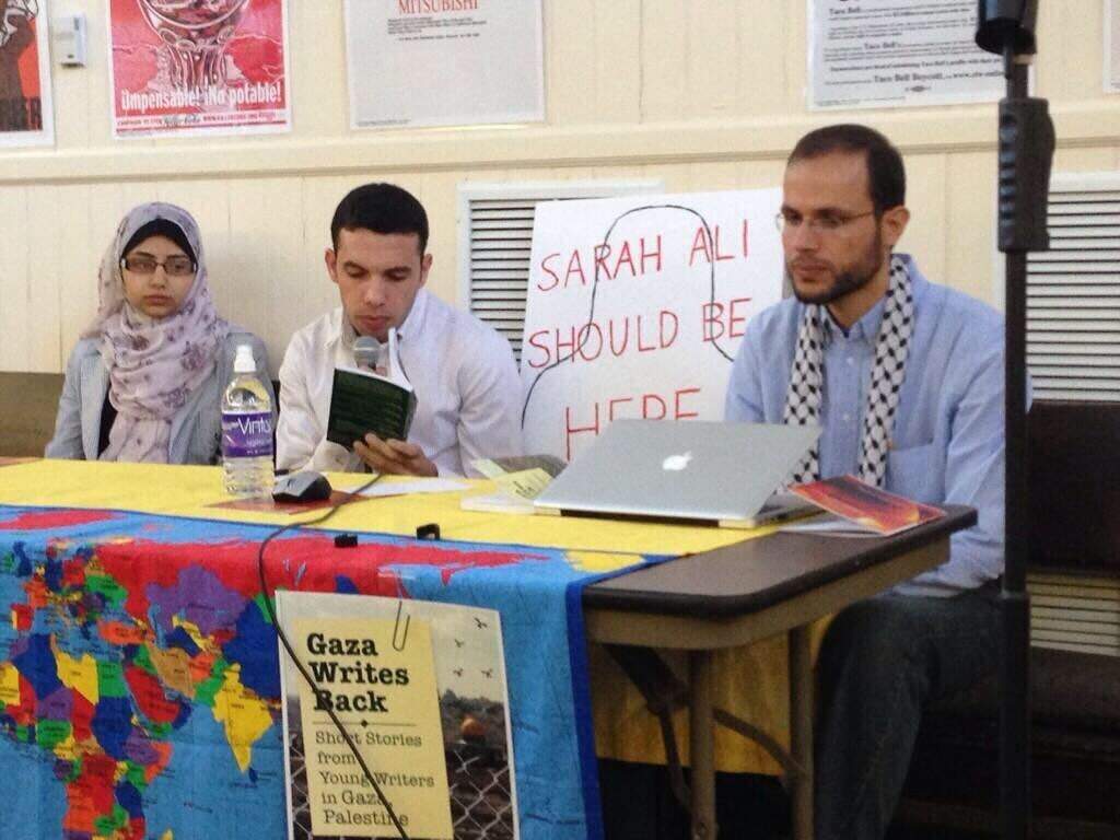 Refaat Alareer (right) and Yousef Aljamal (middle)while on their 2014 American publishing tour for "Gaza Writes Back," an anthology of short stories of young writers in Palestine, which was edited by Alareer and included a story from Aljamal. (Courtesy)