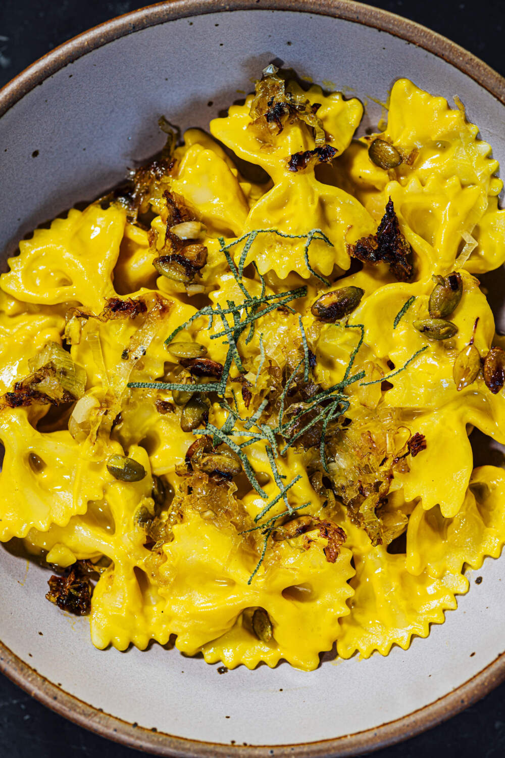 Butternut squash sauce, crispy leeks + farfalle. (Courtesy of Nik Sharma)