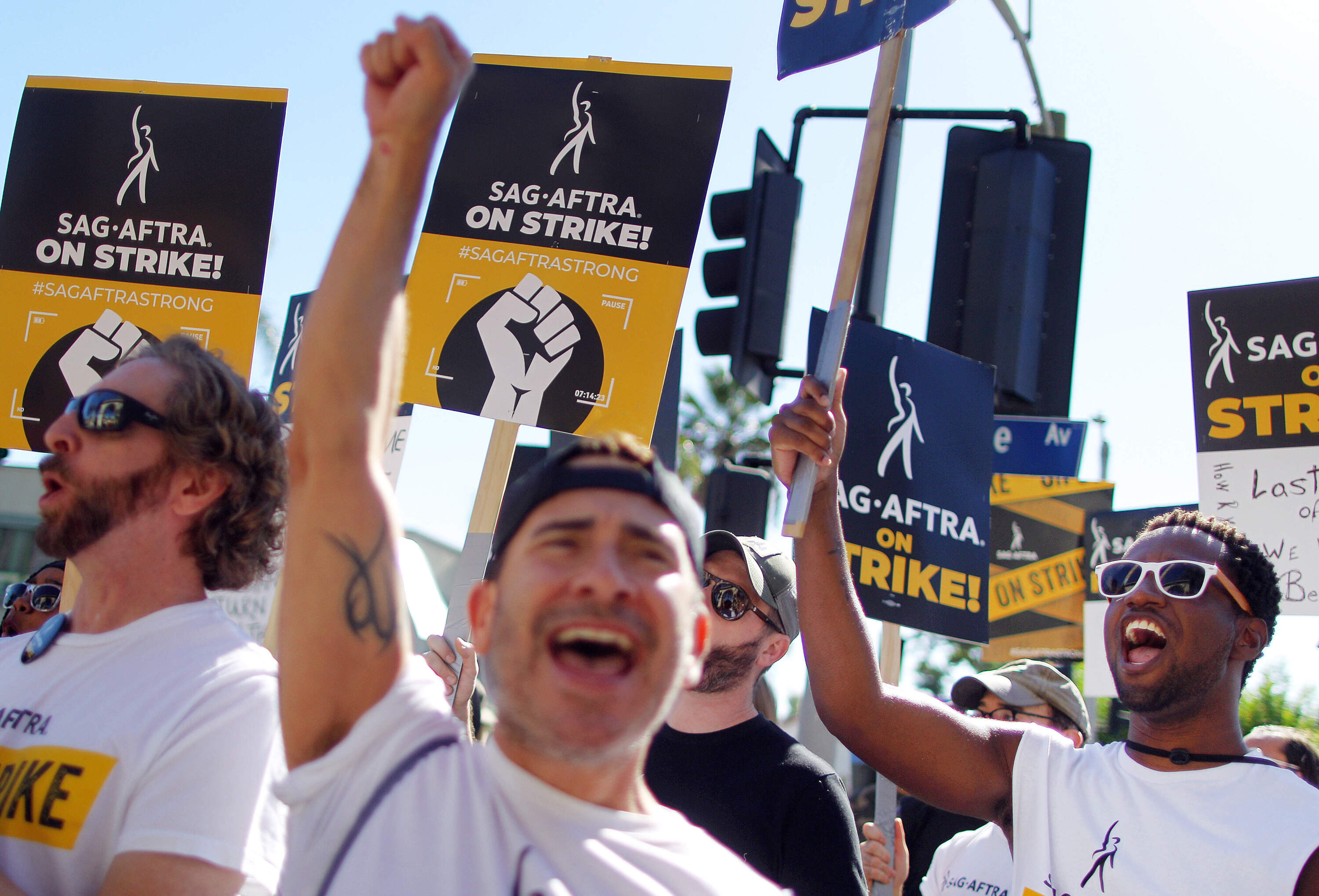 SAG-AFTRA members and supporters chant outside Paramount Studios on day 118 of their strike against the Hollywood studios on Nov. 8, 2023 in Los Angeles, California. (Mario Tama/Getty Images)