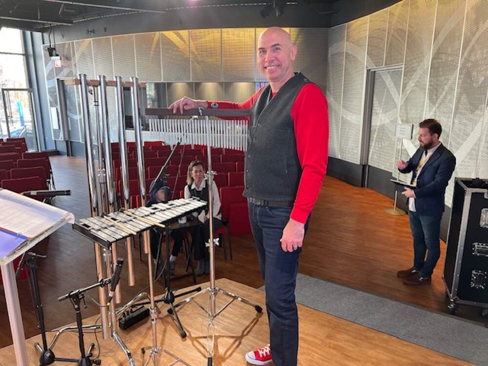 Eric Shimelonis plays the orchestral chimes at WBUR CitySpace, where we recorded this episode! (credit: Rebecca Sheir)
