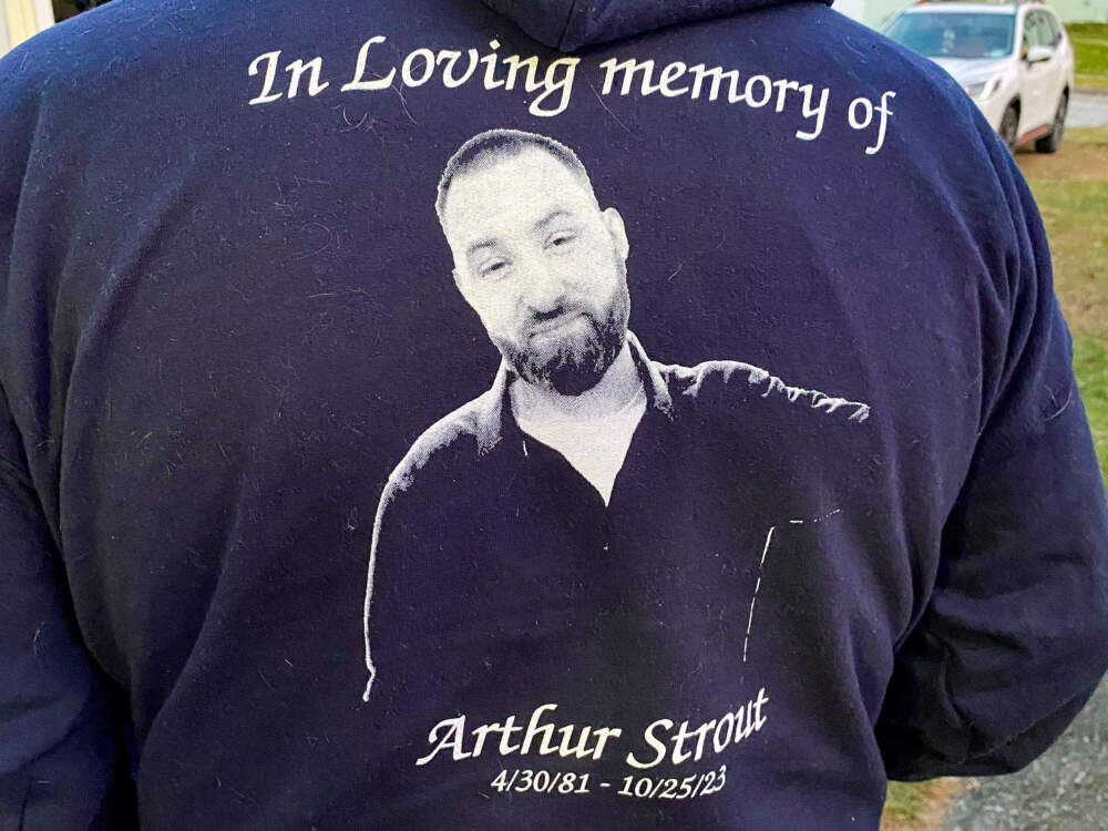 The back of Arthur Bernard's hoodie with an image of his son, Artie Strout. (Anthony Brooks/WBUR)