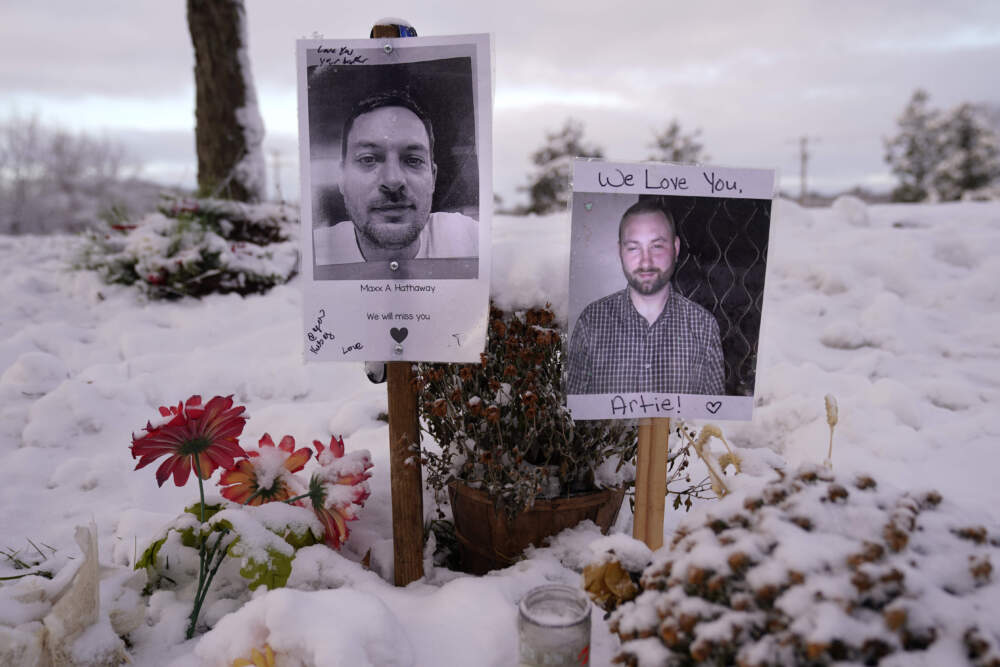 Pictures of two of the victims of last month's mass shooting. (Robert F. Bukaty/AP)