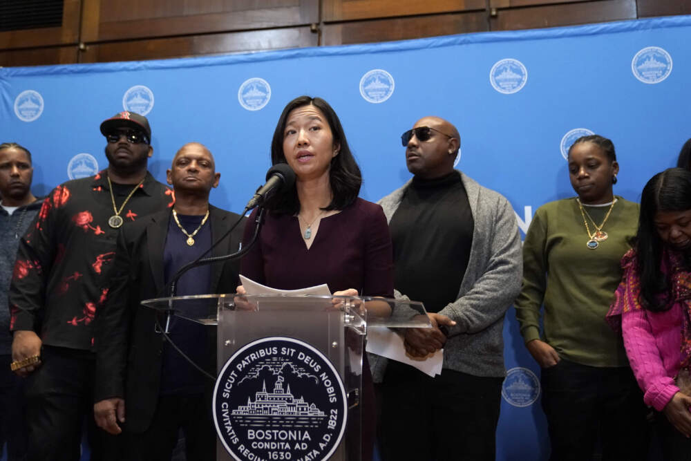 Boston Mayor Michelle Wu issues a formal apology to Alan Swanson and Willie Bennett during a news conference. (Steven Senne/AP)