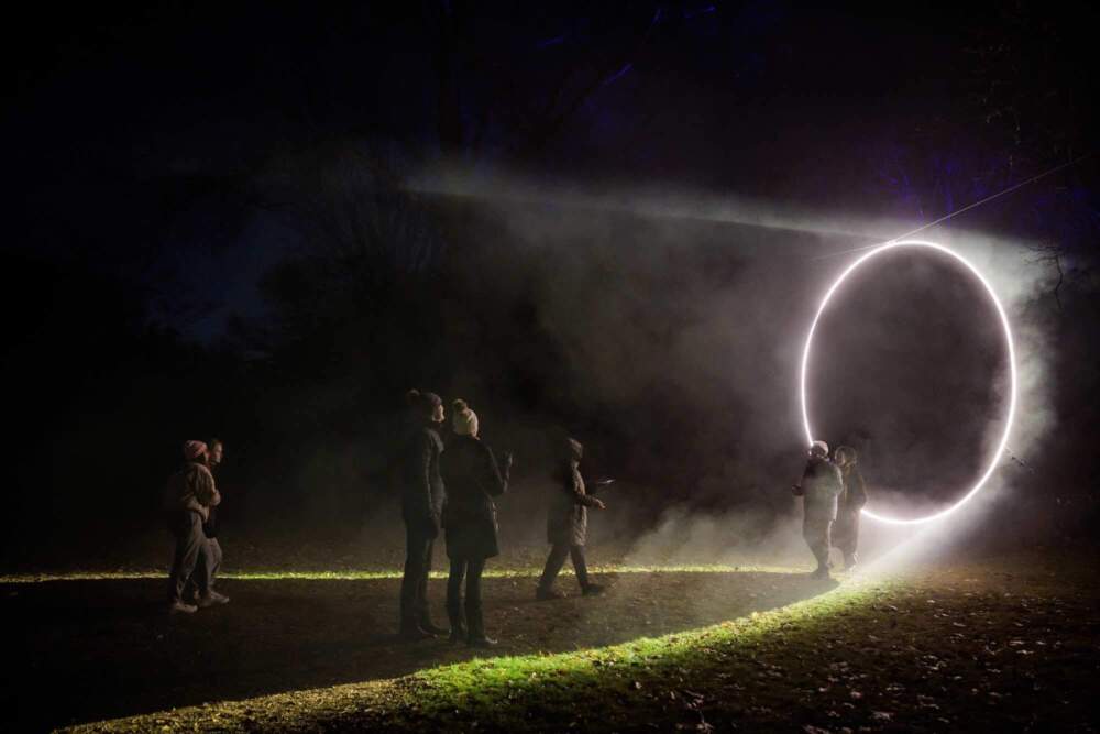 Inspired by an eclipse, the artwork in Hazel Dell features a suspended disc illuminated to create a halo of light. (Courtesy Aram Boghosian)
