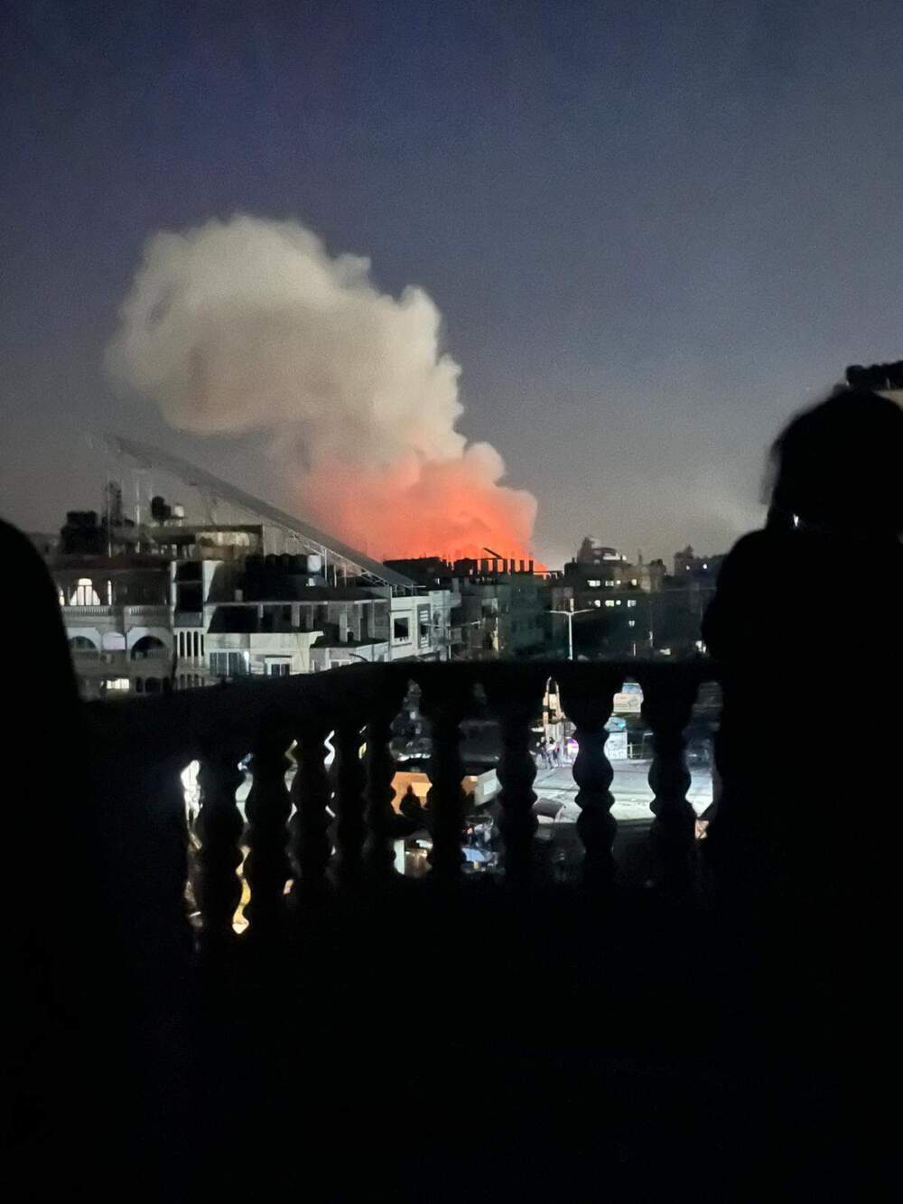 A plume of fire and smoke after an Israeli Forces strike Wednesday night in Rafah. (Courtesy of Shahd Safi)