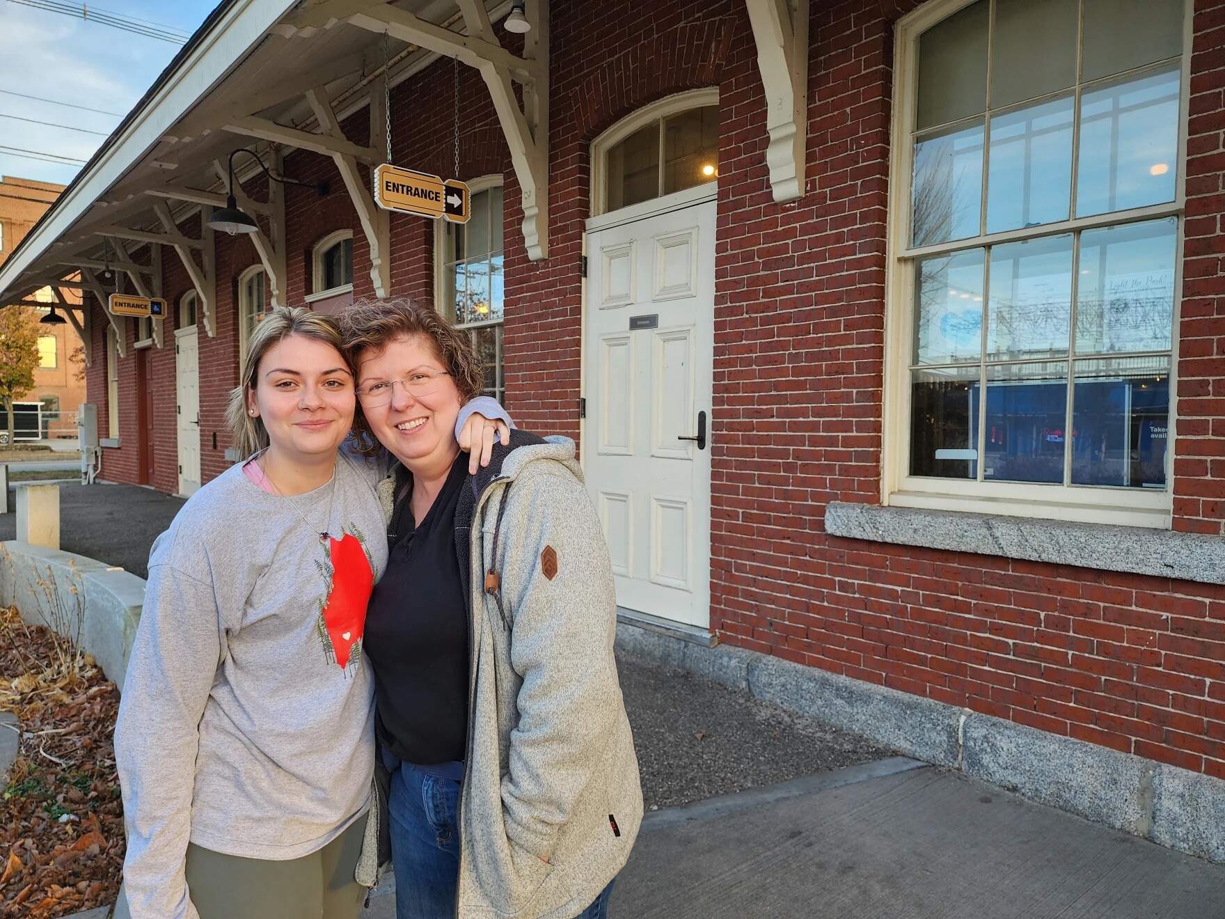 Bethany Welch, left, and Kathy Lebel outside Lebel's restaurant, The Station. (Susan Sharon/Maine Public)