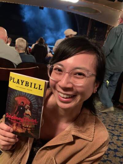 The author in 2023, at the Lunt-Fontanne Theatre with her Sweeney Todd Playbill, in New York City. (Courtesy Thuy Phan)