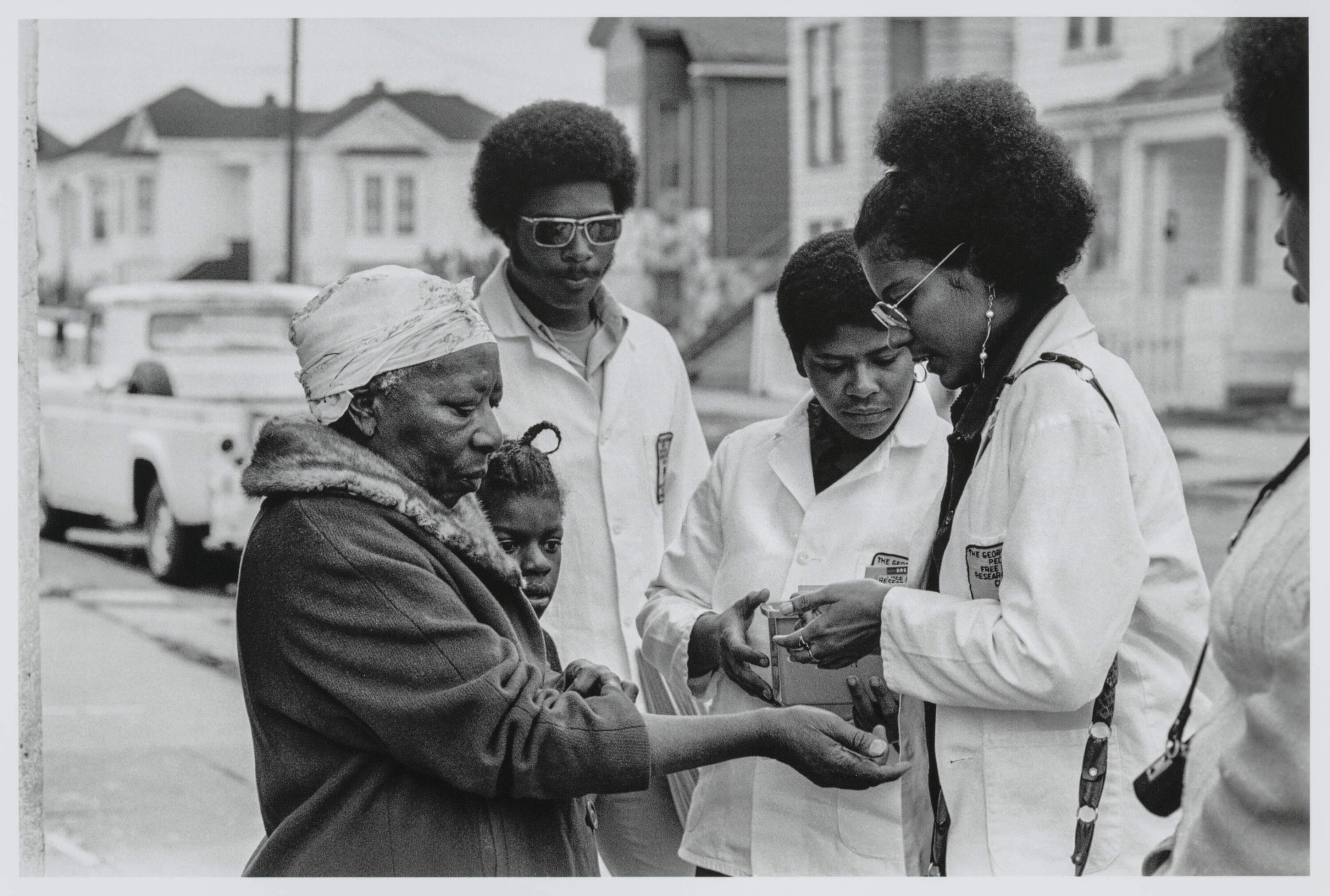 Stephen Shames, "Oakland, California: Adrienne Humphrey tests a woman for sickle cell anemia during Bobby Seale's campaign for Mayor of Oakland," 1973. (Courtesy Museum of Fine Arts, Boston)