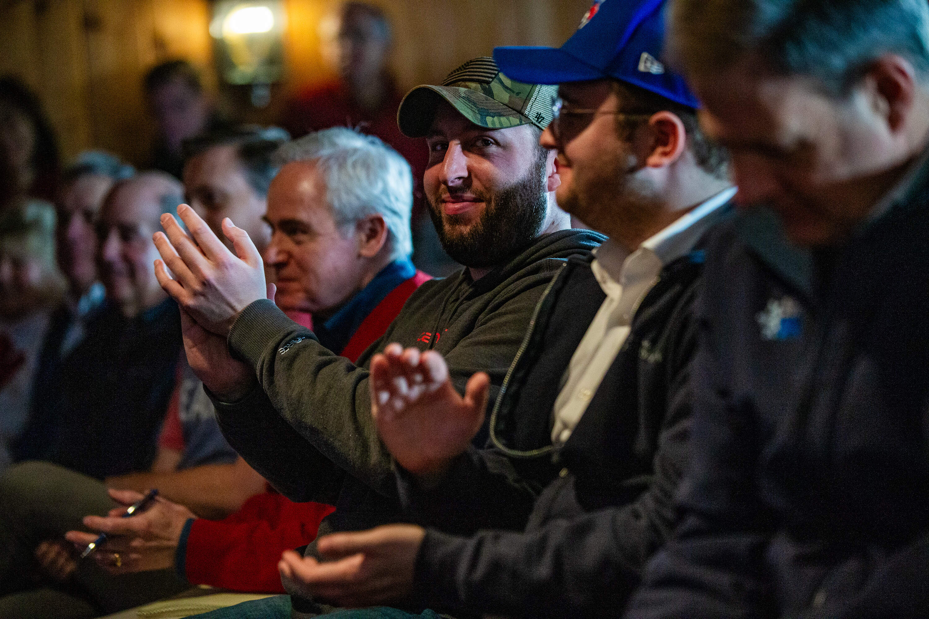 Nikki Haley supporters applaud during her speech at a campaign event in Hollis. (Jesse Costa/WBUR)