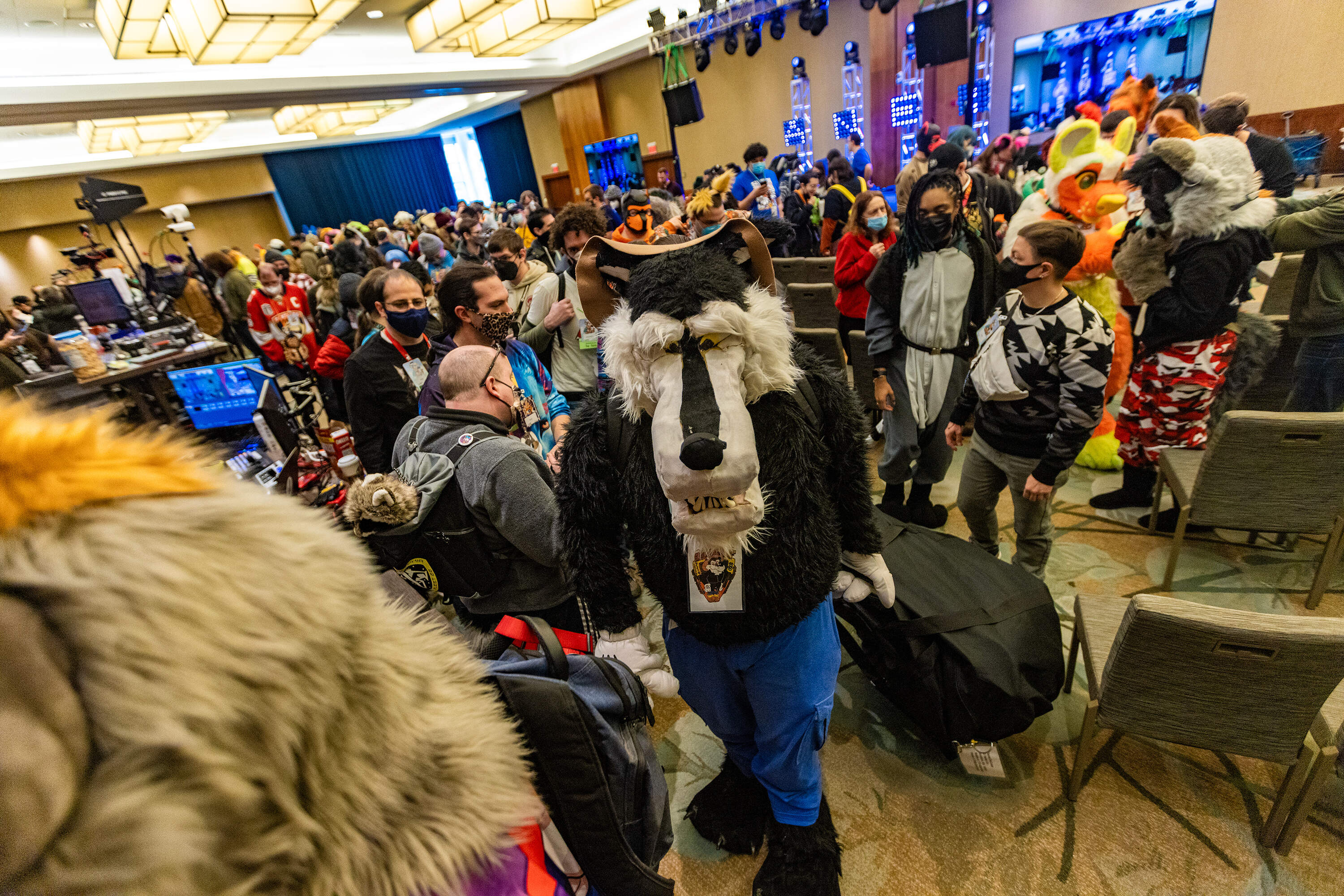 At the conclusion of the opening ceremony, attendees at the Anthro New England conference leave to mingle with one another before the next scheduled event. (Jesse Costa/WBUR)