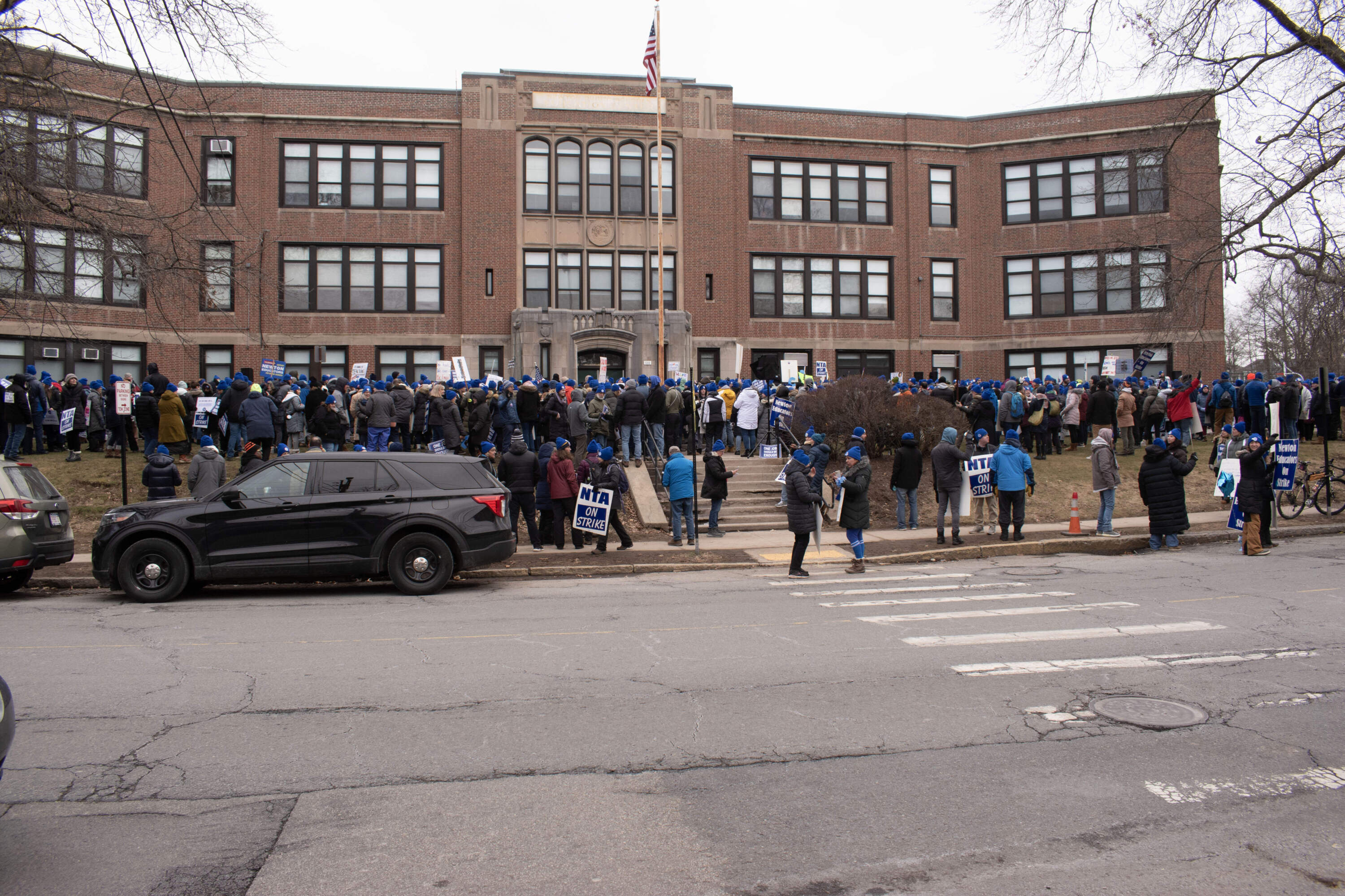 Hundreds of educators attended a rally at the Newton Education Center during the second week of the teachers strike. (Meghan Kelly/WBUR)
