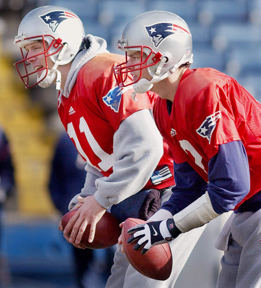 Quarterbacks Tom Brady and Drew Bledsoe line up during team practice in ahead of Super Bowl XXXVI. (Michael Dwyer/AP)