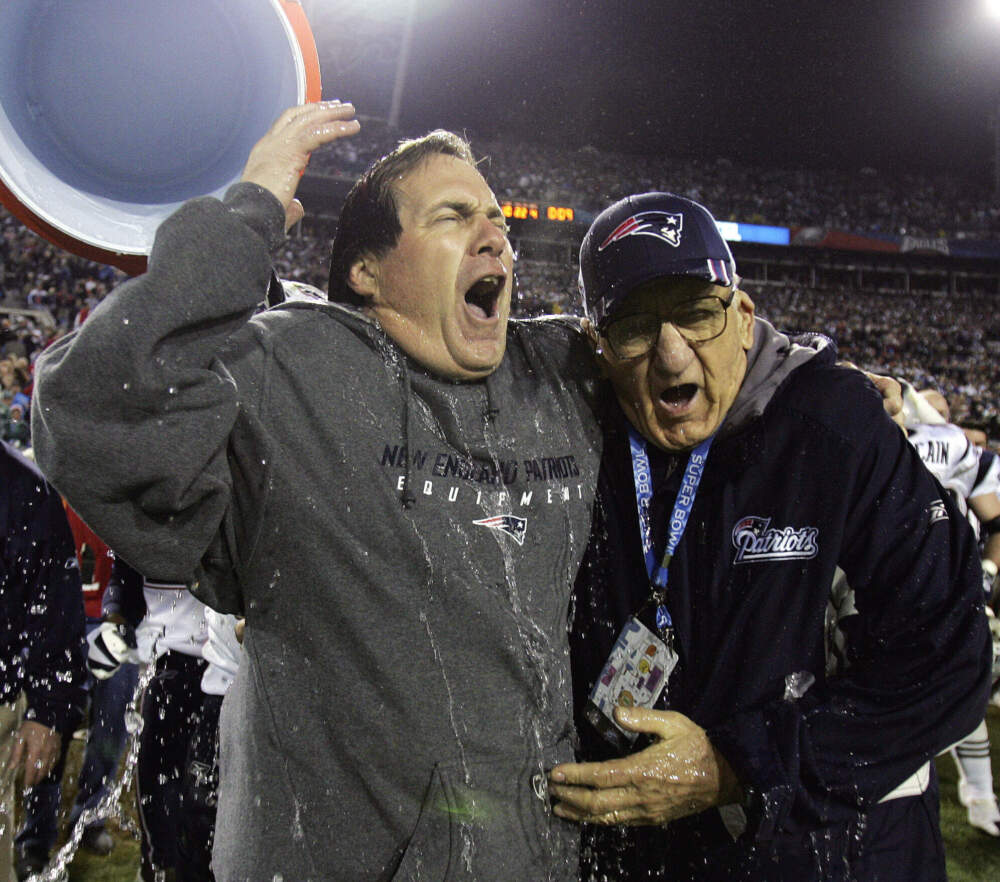 Bill Belichick and his father Steve react after being doused following Patriots win in Super Bowl XXXIX.(David J. Phillip/AP)