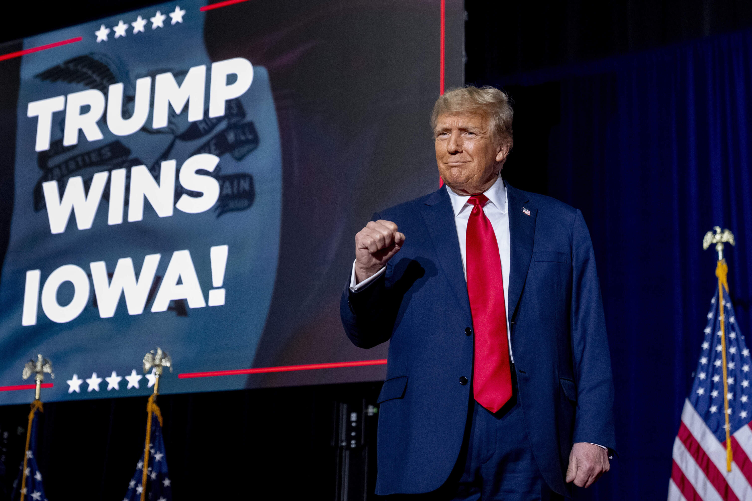 Republican presidential candidate former President Donald Trump takes the stage at a caucus night party in Des Moines, Iowa, Monday, Jan. 15, 2024. (Andrew Harnik/AP)