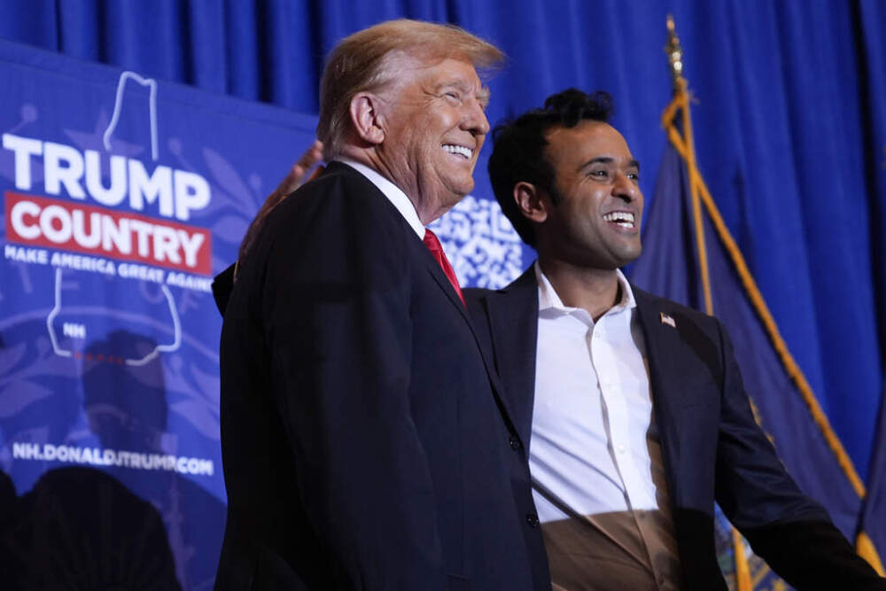 Republican presidential candidate Donald Trump appears on stage with former candidate Vivek Ramaswamy at a campaign event in Atkinson, N.H., Tuesday, Jan. 16, 2024. (Matt Rourke/AP)