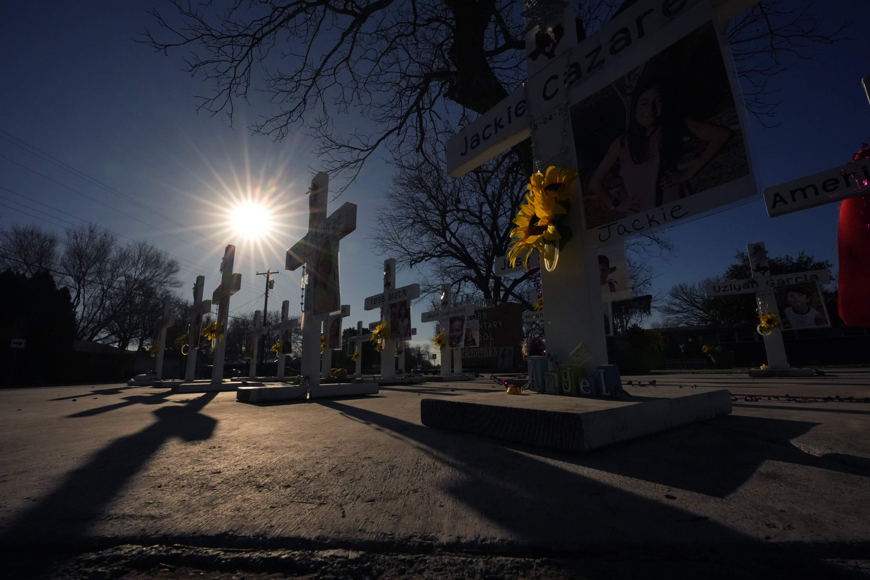 Crosses stand in memorial to victims of the school shooting at Robb Elementary, Thursday, Jan. 18, 2024, in Uvalde, Texas. The Justice Department has released a report with their findings after an investigation into the 2022 school shooting. (Eric Gay/AP)