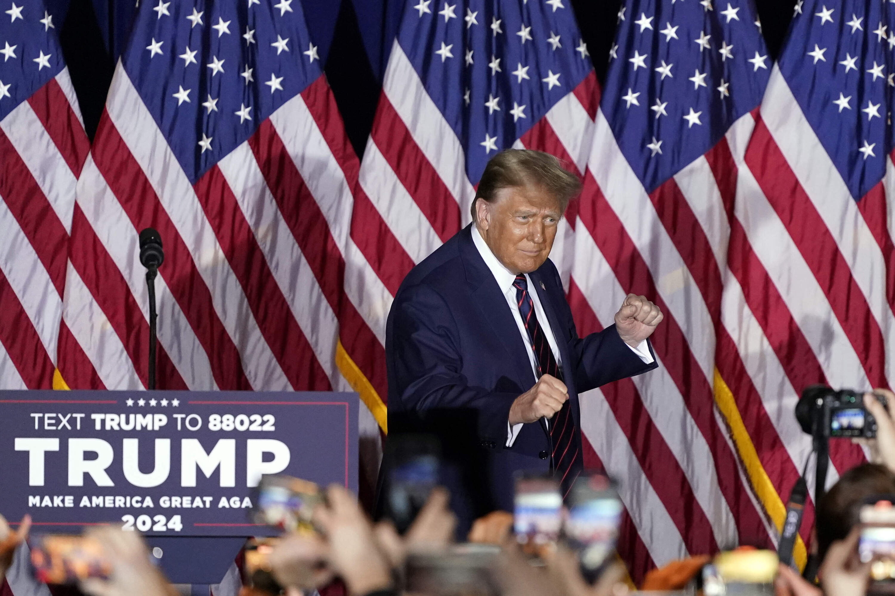 Republican presidential candidate former President Donald Trump arrives to speak at a primary election night party in Nashua. (Pablo Martinez Monsivais/AP)