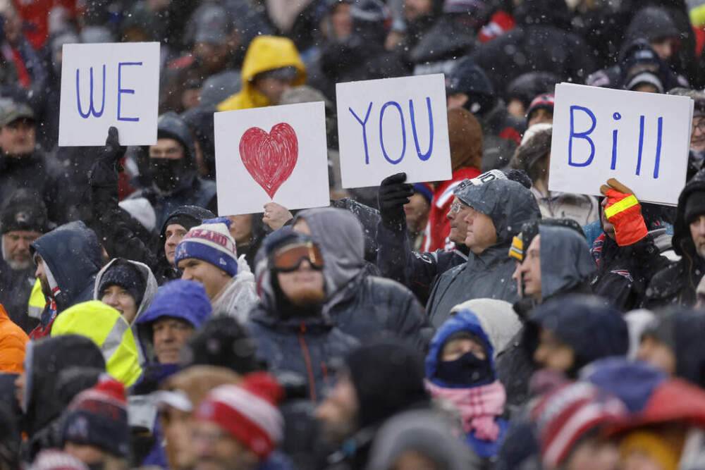 Fans show their support of New England Patriots head coach Bill Belichick during the first half of a football game against the New York Jets, Sunday. (Michael Dwyer/AP)