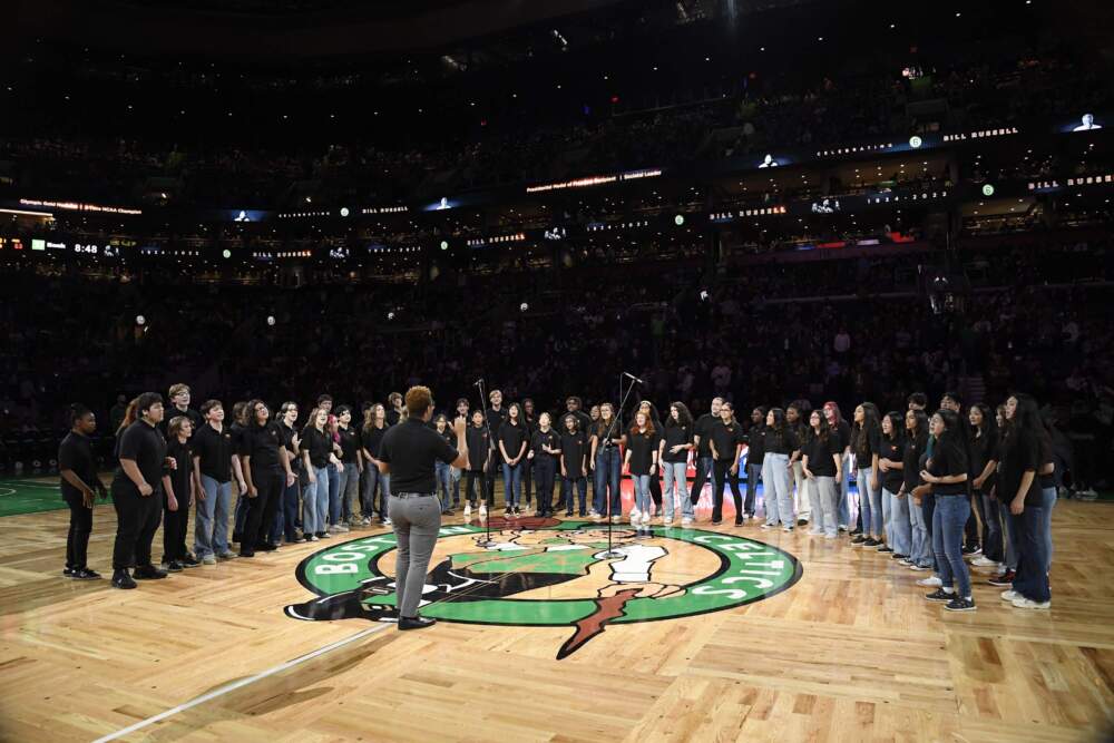 Boston Children's Chorus Recital Choir, Concert Choir, and Premier Choir singing at the Boston Celtics Home Opener halftime show in honor of basketball legend and civil rights advocate Bill Rusell in October 2022. (Courtesy Boston Celtics) 
