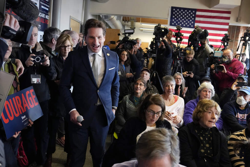 Democratic presidential candidate Rep. Dean Phillips walks through a crowd during a campaign stop in Manchester, N.H. (Charles Krupa/AP)