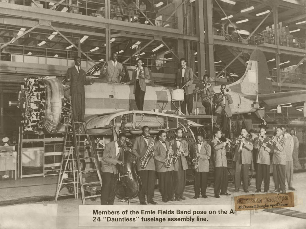 Members of the Ernie Fields Band pose on the A-24 &quot;Dauntless&quot; fuselage assembly line. (Courtesy Carmen Fields)