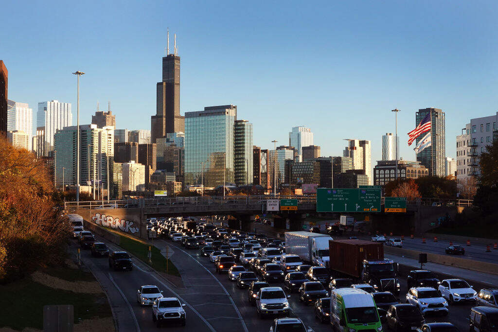 CHICAGO, ILLINOIS - NOVEMBER 13: Commuters leave downtown on November 13, 2023 in Chicago, Illinois. The Chicago area is one of only a few metropolitan areas in the country to see an uptick in interest in its luxury home market, which contributed to a listing price increase of more than 14 percent in the past year. (Photo by Scott Olson/Getty Images)