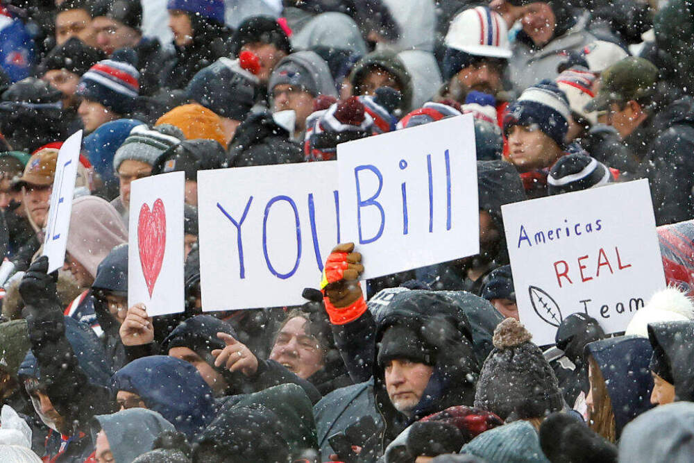 A view of New England Patriots fans holding a "heart you Bill" sign are seen in the first half at Gillette Stadium on Jan. 7, 2024 in Foxborough, Massachusetts. (Winslow Townson/Getty Images)