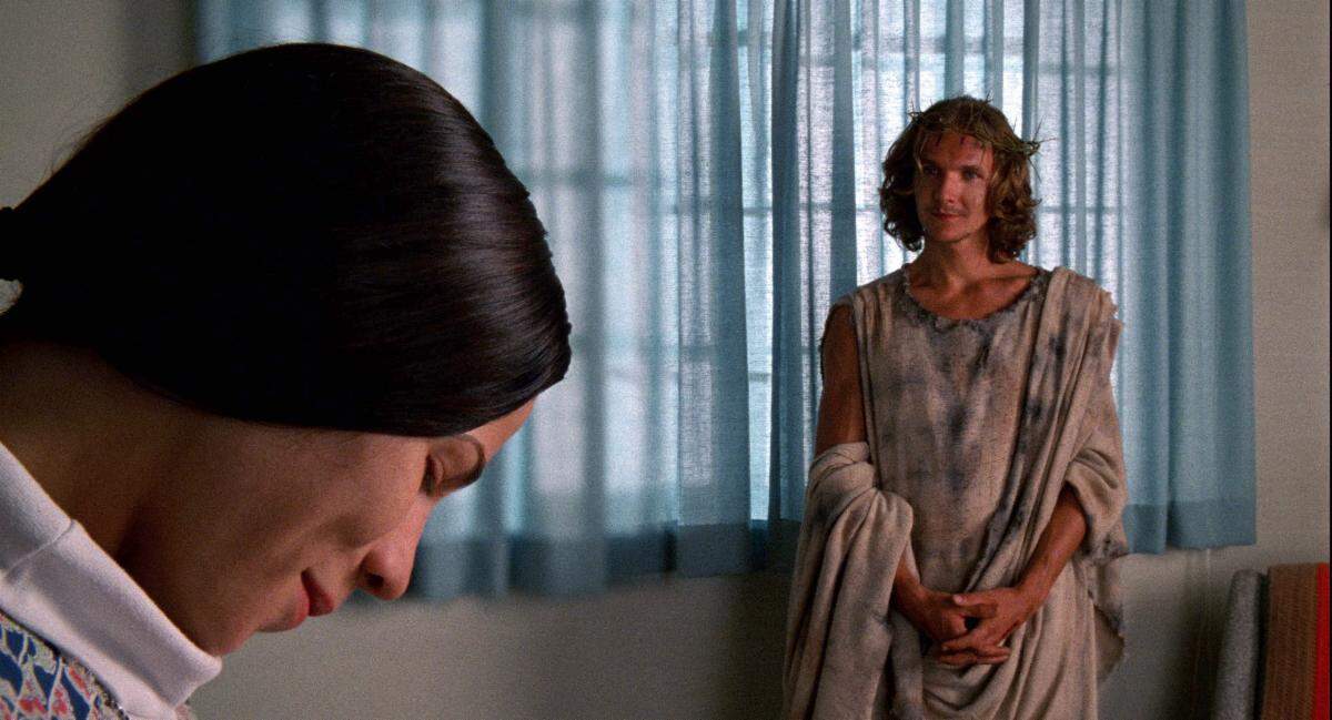 Lili Taylor and Sebasan Roché in "Household Saints." (Courtesy Milestone Films/Kino Lorber)
