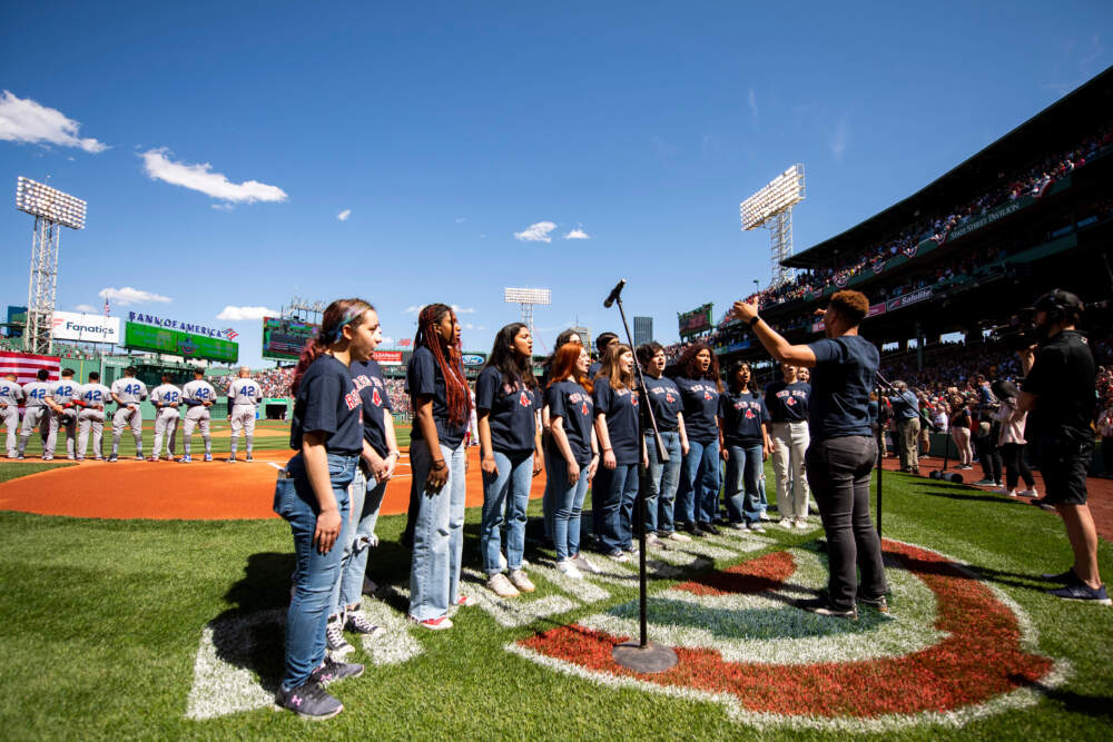 Members of Premier Choir performing the national anthem at the Boston Red Sox's Opening Day in April 2022. (Courtesy Rachel O'Driscoll/Boston Red Sox) 