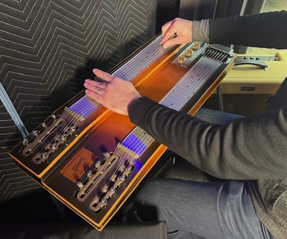 Eric Shimelonis used a 1948 Gibson double-necked steel guitar (set on a stand, since it’s so big!) to score this episode. (credit: Rebecca Sheir)