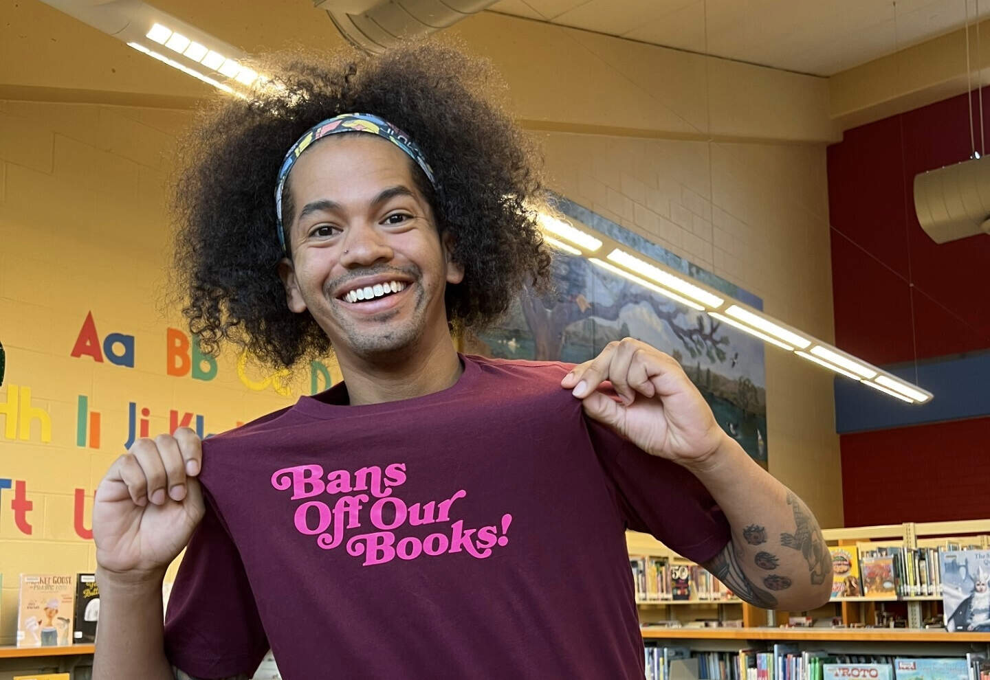 Librarian Mychal Threets showcases the joy of books across social media |  NCPR News