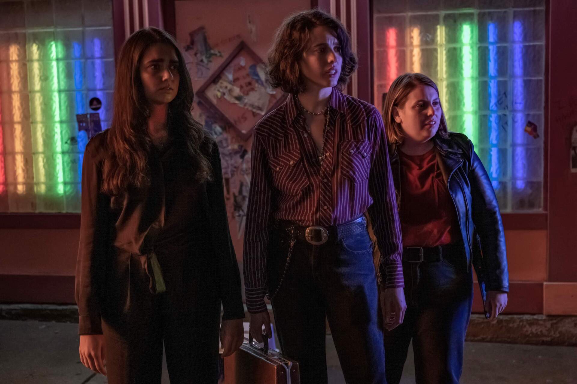 From left: Geraldine Viswanathan, Margaret Qualley and Beanie Feldstein in &quot;Drive-Away Dolls.&quot; (Courtesy Wilson Webb/Working Title/Focus Features)