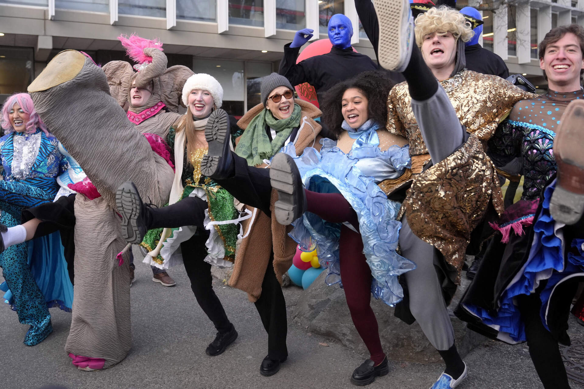 Actor Annette Bening, center, Hasty Pudding 2024 Woman of the Year, dances with Harvard University theatrical students. (Steven Senne/AP)