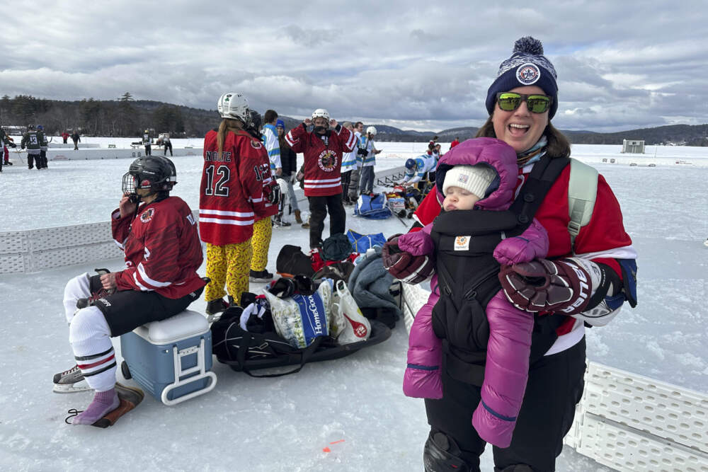 Hockey players assemble for a game in Meredith, N.H. (Nick Perry/AP)