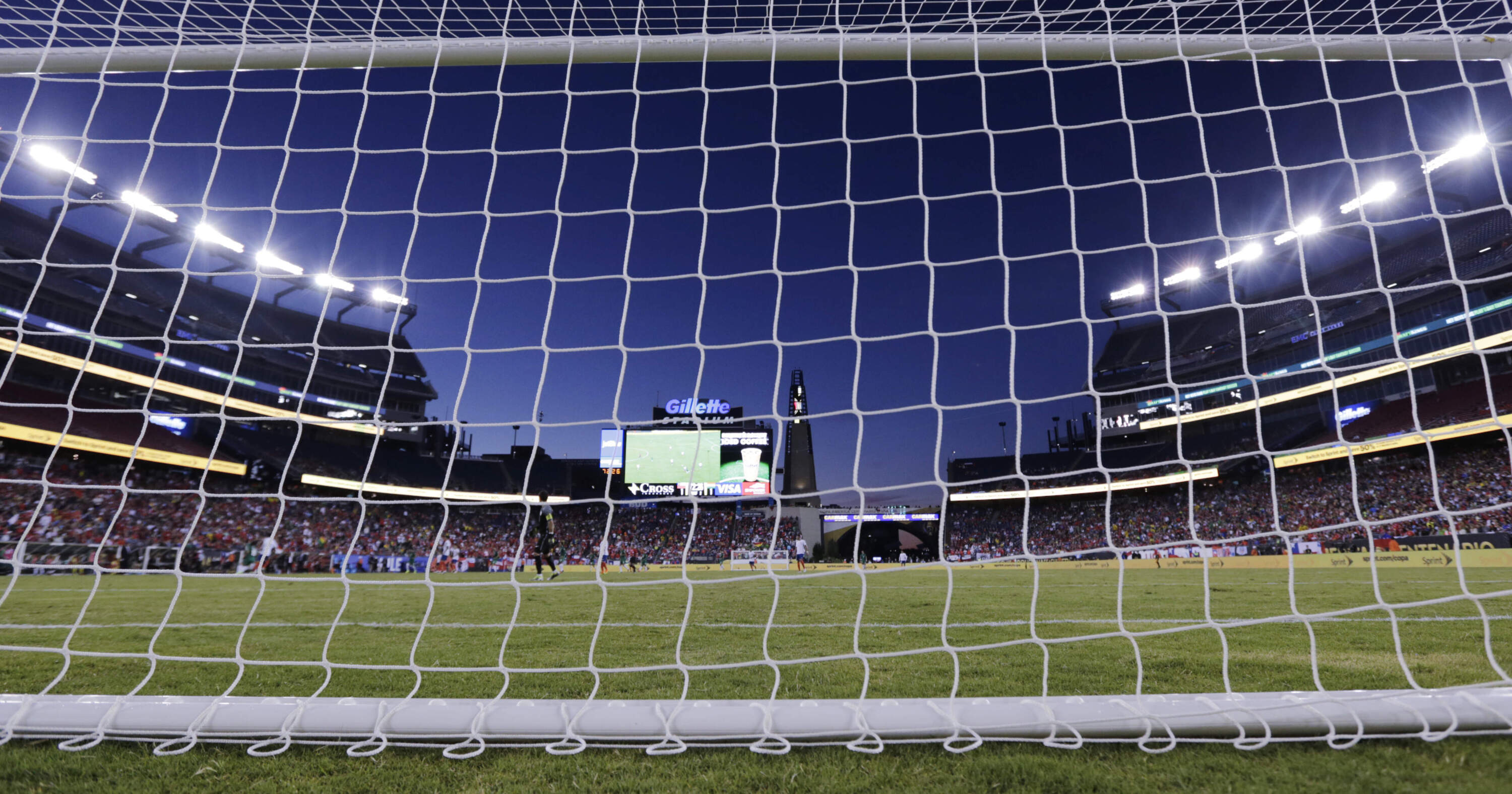 Lights illuminate the field at Gillette Stadium during a soccer match in 2016. (Charles Krupa/AP)