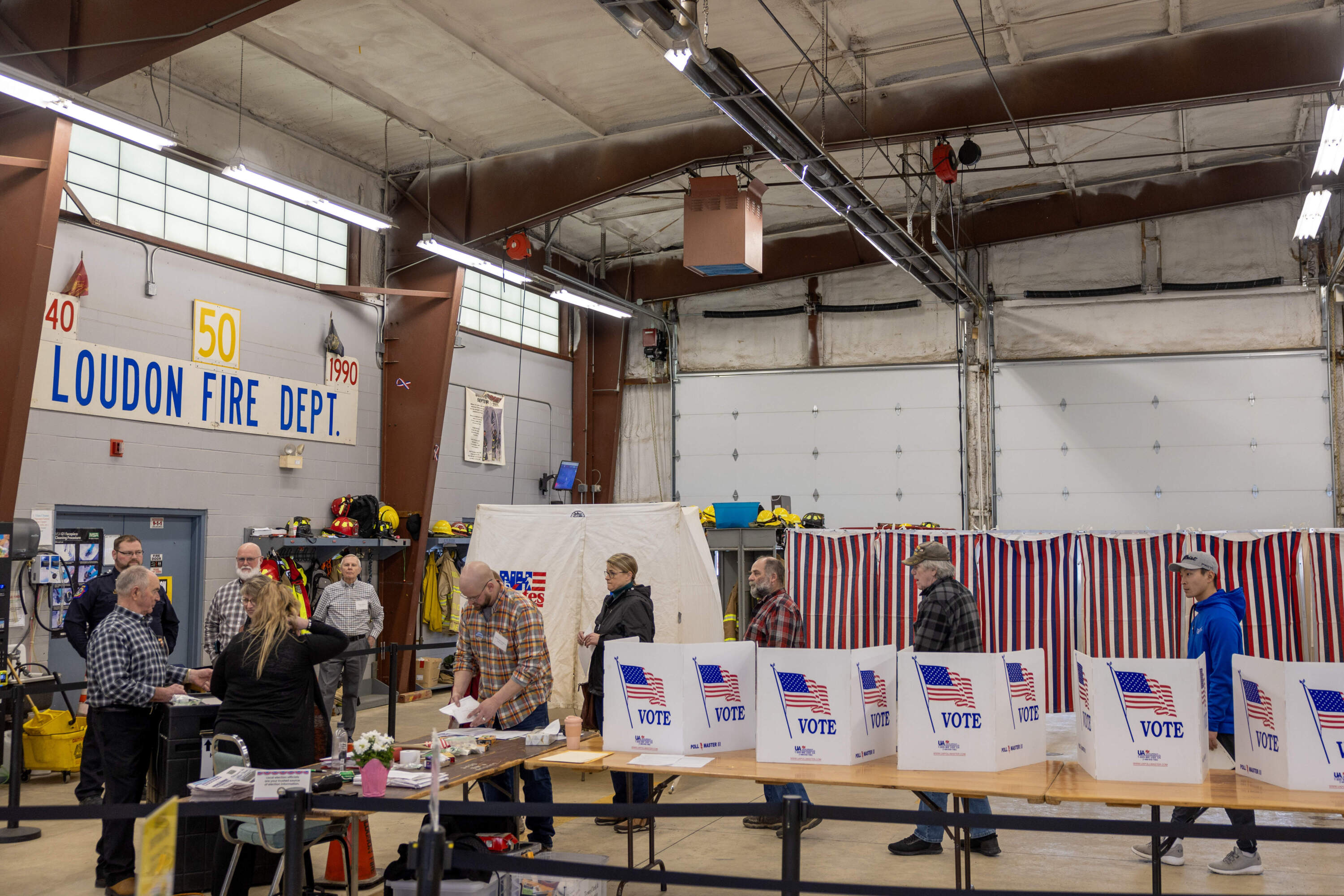 Voters wait to cast their ballots on Jan. 23, 2024 in Loudon, New Hampshire. (Tasos Katopodis/Getty Images)